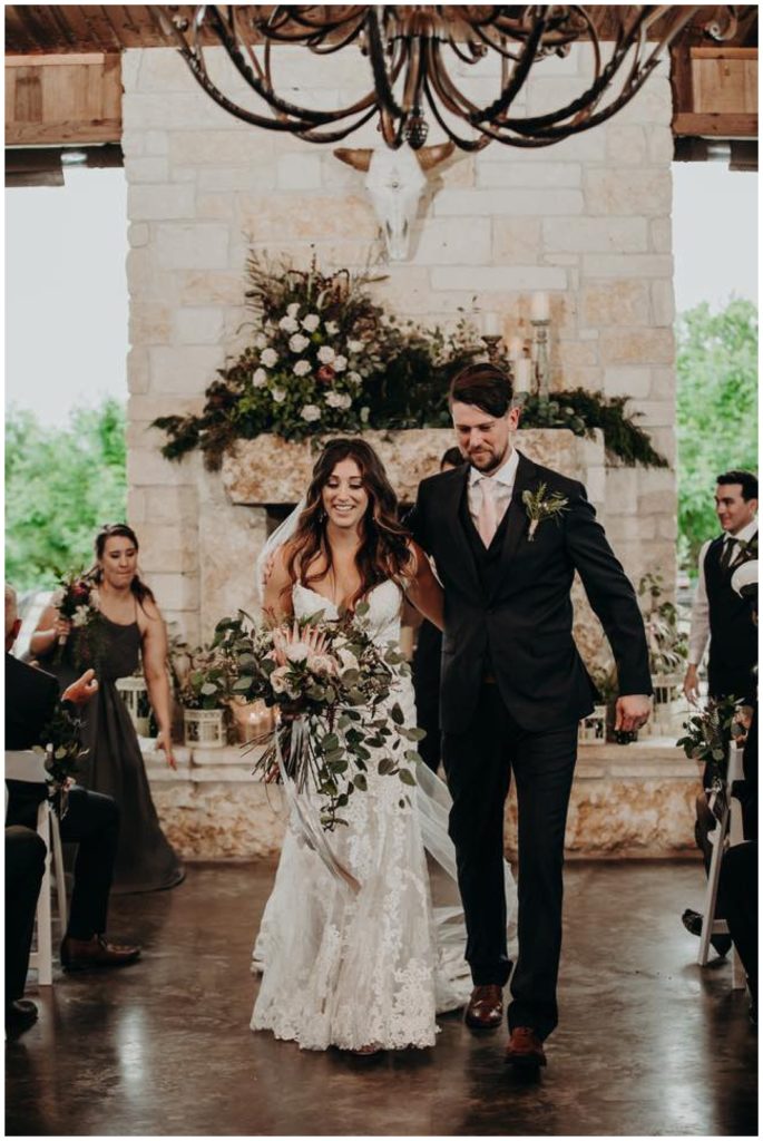 The Boho Couple after the ceremony at Houston's Winery Wedding Venue 