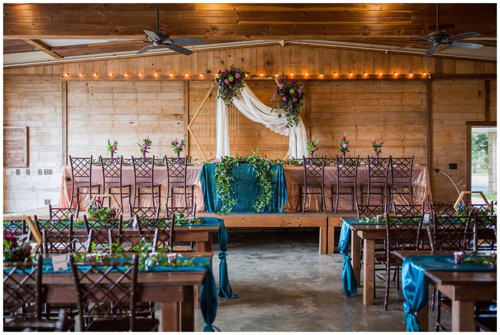 Crystal and Lace on hexagon backdrop | Peacock Themed wedding at Emery's Buffalo Creek 