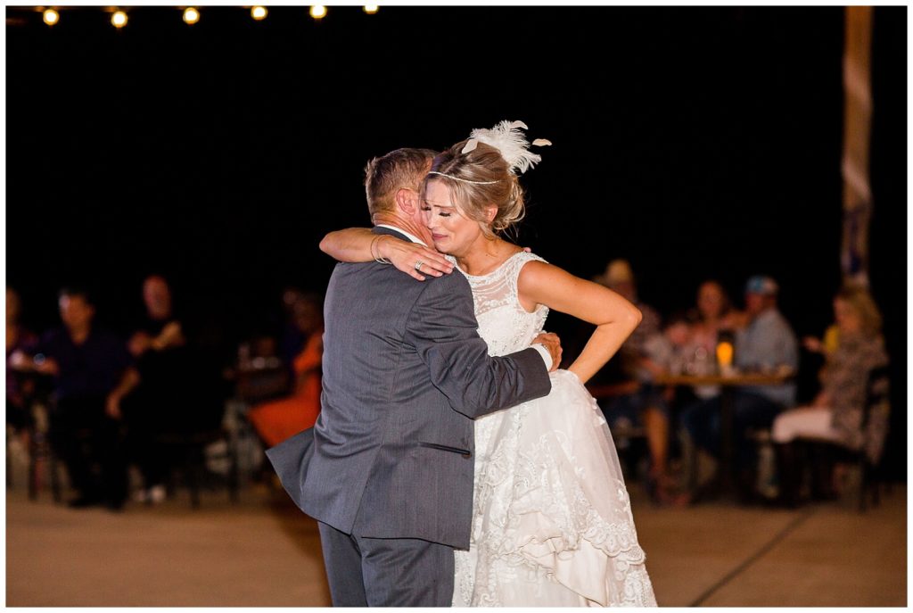 Sweet father and daughter dance at Emery's Buffalo Creek | Peacock themed wedding at Houston Winery Wedding Venue 