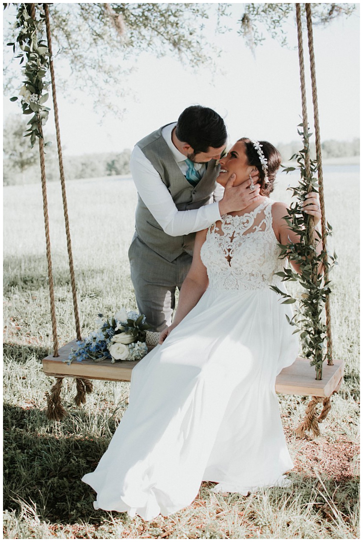 The couple at Emery's Buffalo Creek Swing | Ocean Blue inspired Wedding 