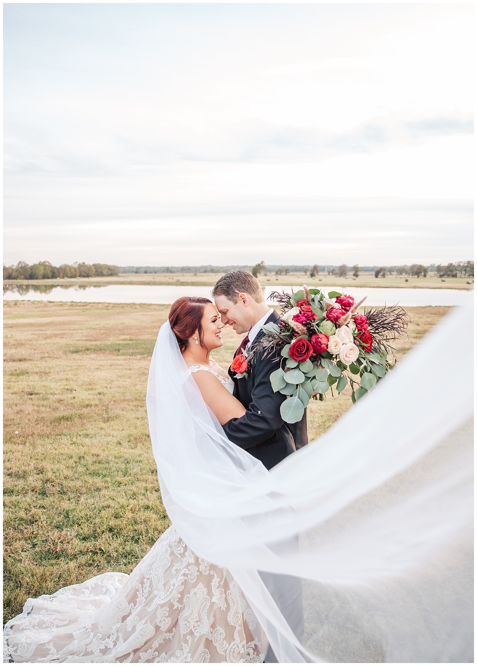 A private moment between the newlyweds at Emery's Buffalo Creek | Glam Burgundy and Blush wedding 