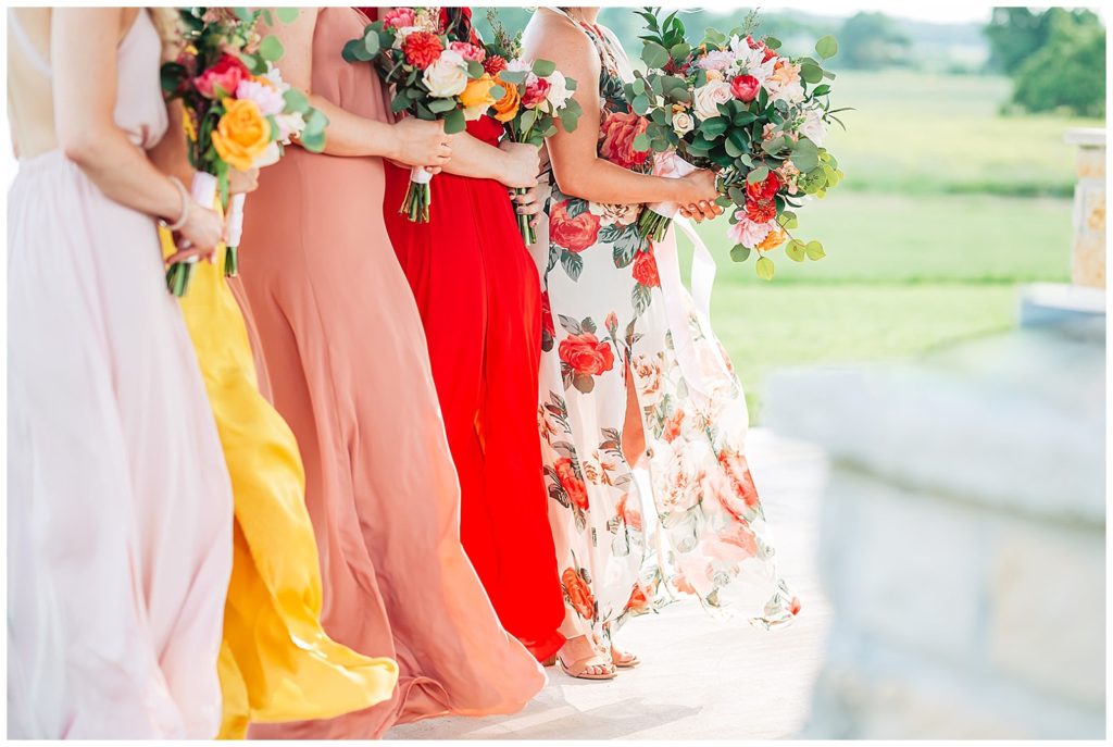 Perfect mix-match vibrant modern Boho Bridesmaid dresses at Emery's Buffalo Creek 