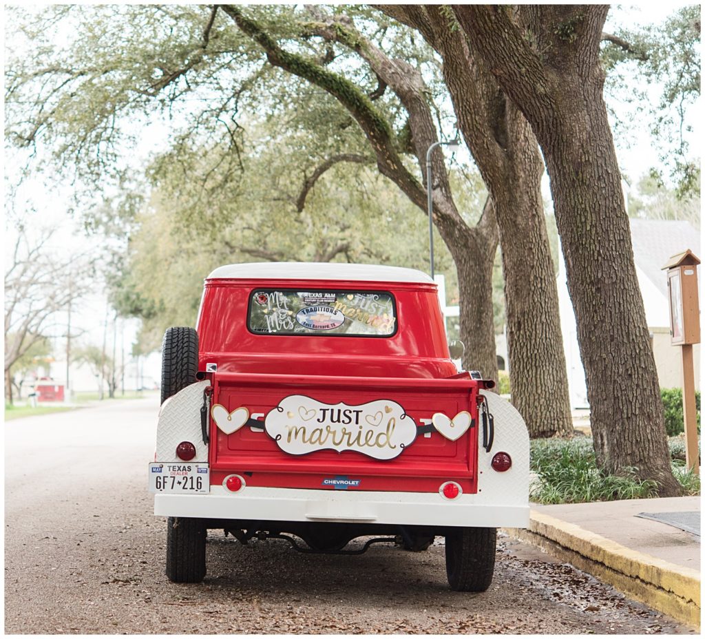 Cute red getaway truck for the couple at Houston's Wedding Winery venue | Yellow Farmhouse style Wedding  