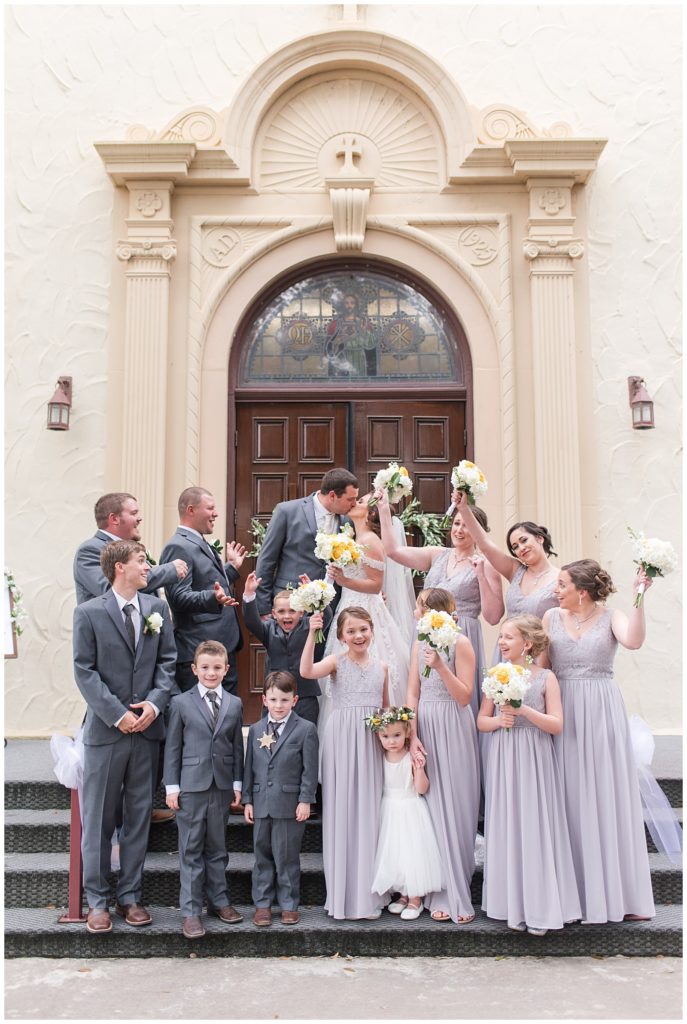 Bridal Party at Holy Cross Catholic Church in East Bernard | Yellow and grey farmhouse style wedding in Bellville, TX 