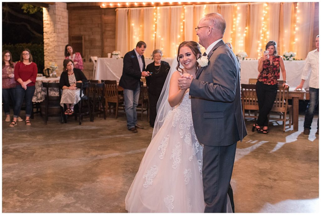 Father and daughter dance at Houston's only Wedding Winery venue | Yellow Farmhouse style Wedding 
