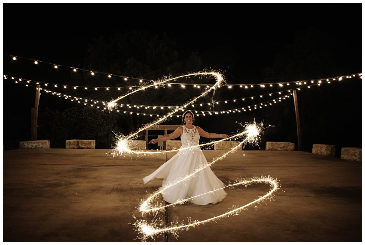 Bride and her sparklers | Kindred Soul Photography at Emery's Buffalo Creek 