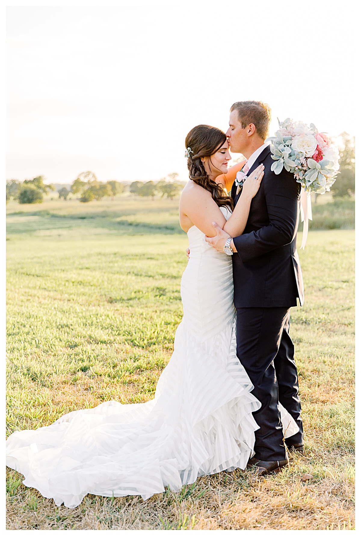Couple in the beautiful countryside of Bellville, Texas | Emery's Buffalo Creek Wedding Venue