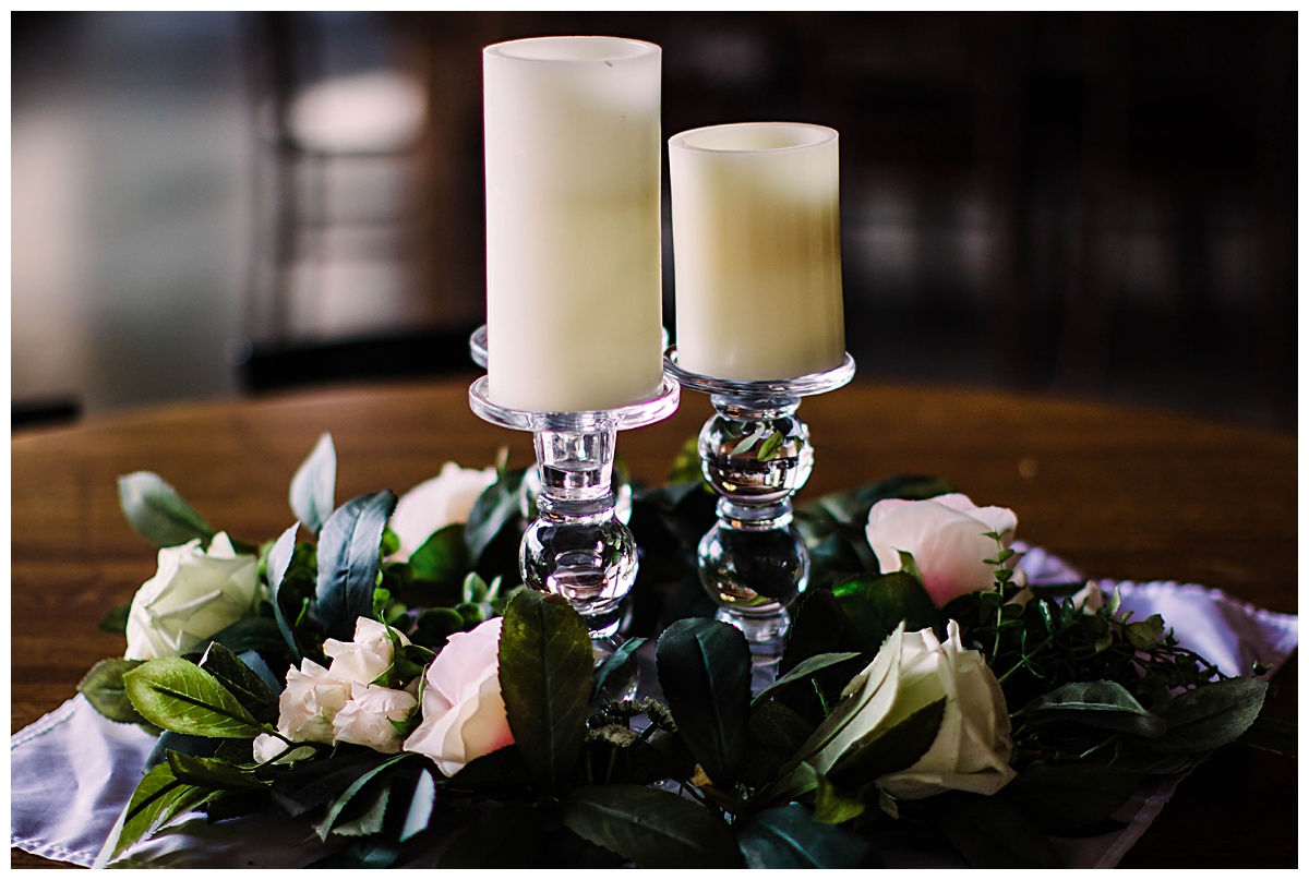 Classy candlesticks with greenery at Houston Winery wedding venue 