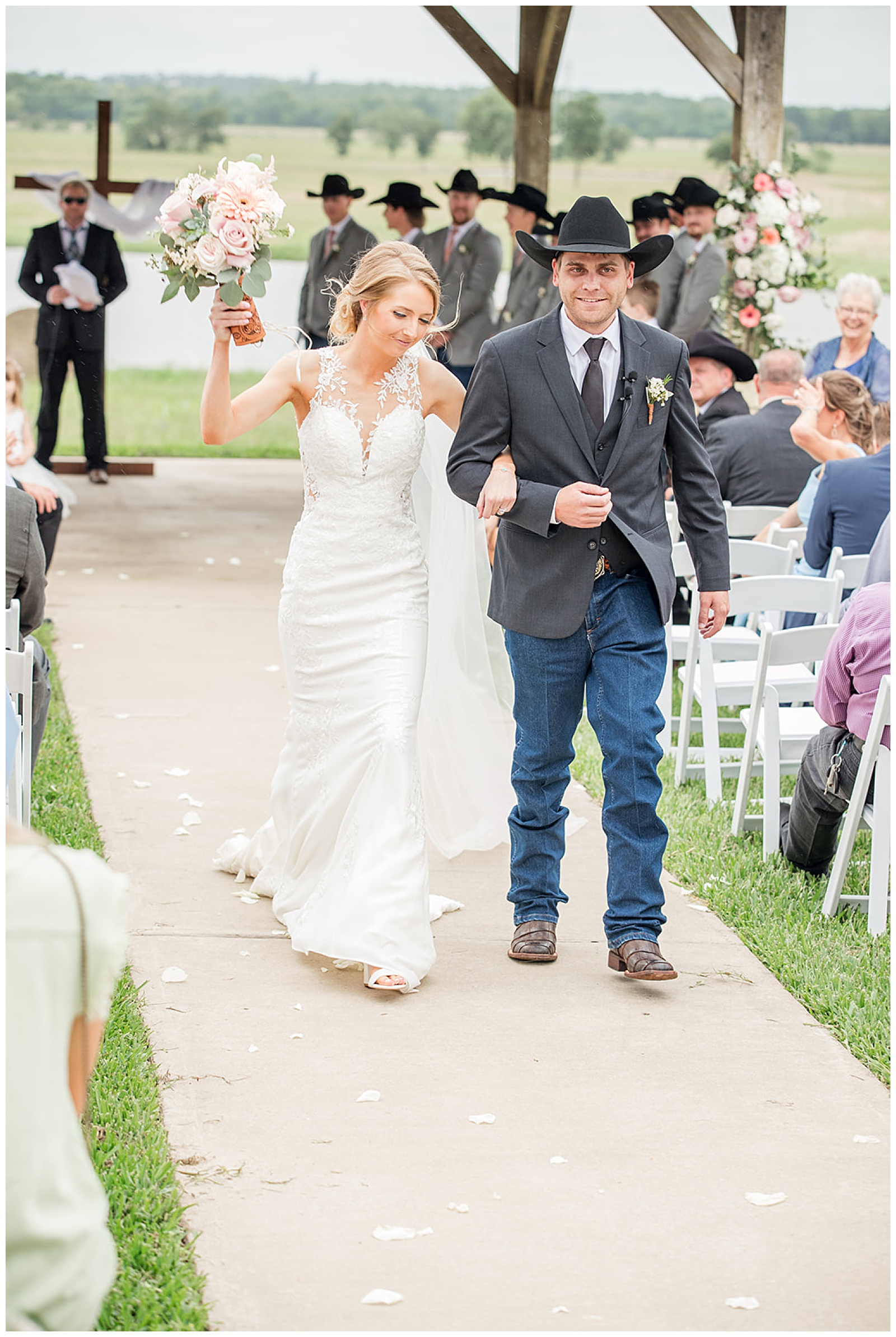 Husband and wife walking back down the aisle after the Texas wedding ceremony at Emery's Buffalo Creek