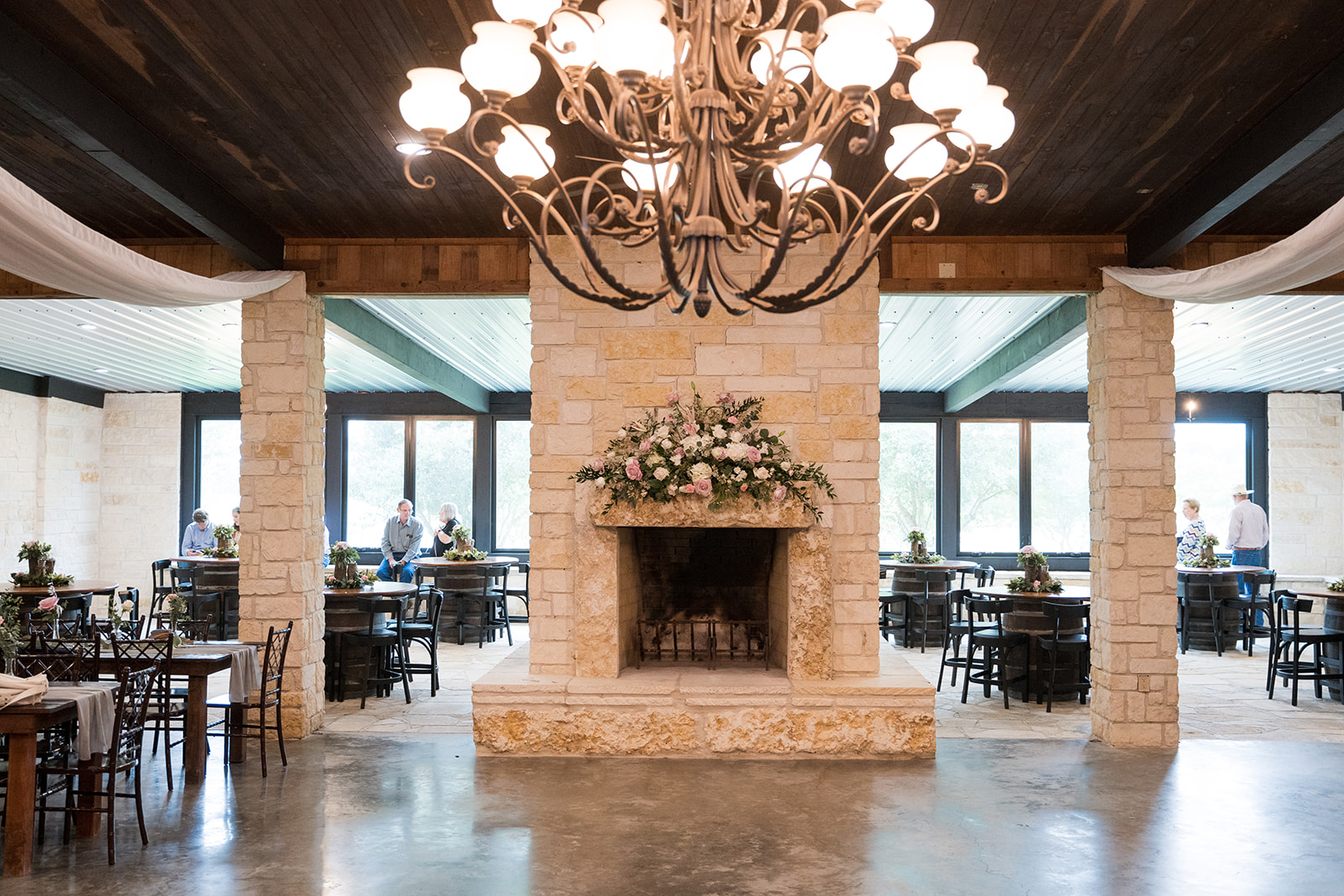 The grand fireplace in Emery's Buffalo Creek wedding venue before the Texas wedding 